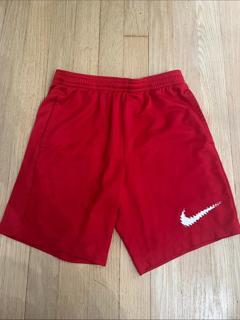 Nike Red Athletic Shorts with White Swoosh